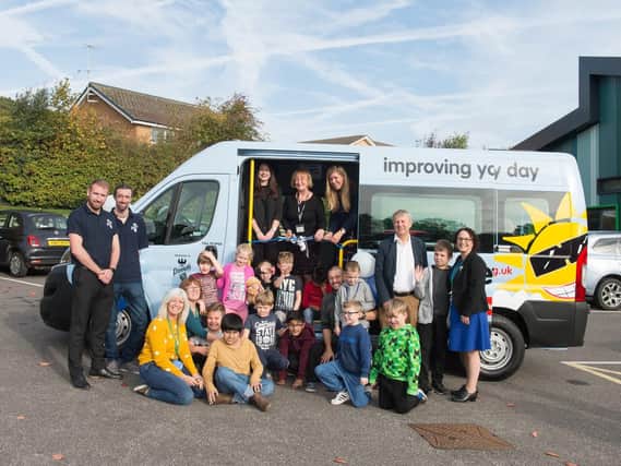 Rowan School staff and pupils with the new minibus
