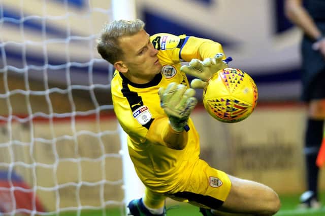 Adam Davies makes his second penalty save for Barnsley to win 4-2 on penalties.