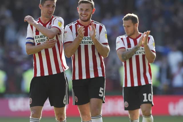 Chris Basham, Jack O'Connell (centre) and Billy Sharp are all expected to face Sheffield Wednesday