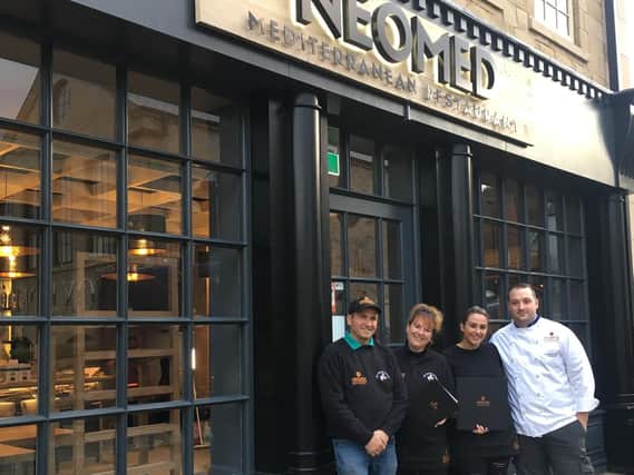 Staff at Neo Med, a Mediterranean restaurant which openedin November at Fox Valley,