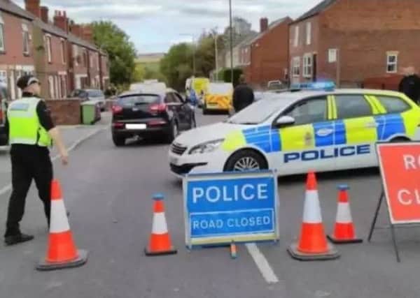 Pictured is Rotherham Road, at Killamarsh, which was cordoned off by police after a reported shooting on September 30.