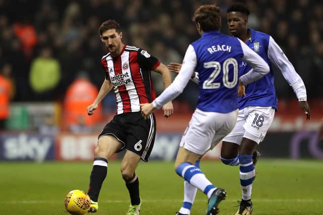 Sheffield United's Chris Basham and Sheffield Wednesday's Adam Reach and Lucas Joao in action at Bramall Lane last season