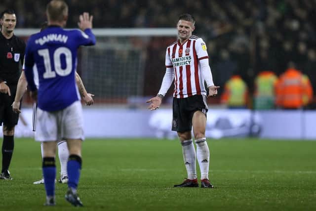 Oliver Norwood of Sheffield United gestures to Barry Bannan of Sheffield Wednesday after he through the ball away to time waste during the Sky Bet Championship match at Bramall Lane Stadium, Sheffield. Picture date 09th November 2018. Picture credit should read: James Wilson/Sportimage