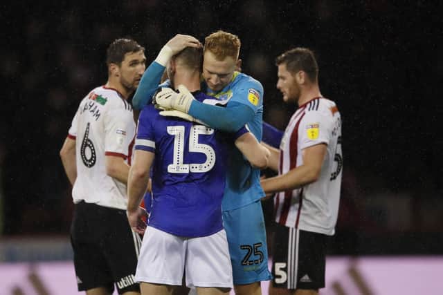 Cameron Dawson of Sheffield Wednesday hugs Tom Lees. Simon Bellis/Sportimage.