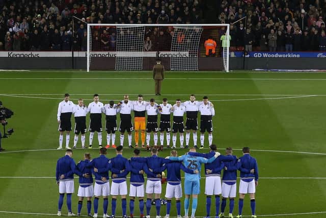 Players from both Sheffield United and Sheffield Wednesday line up for a minute's silence ahead of the derby: James Wilson/Sportimage
