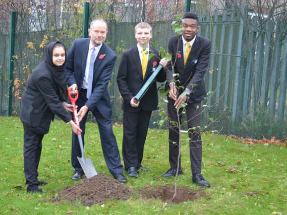 MP Paul Blomfield plants trees with students at the Park Academy in Sheffield
