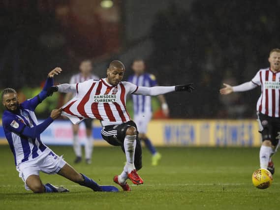 Sheffield United manager Chris Wilder loves how his team, including Leon Clarke, approach their football: Simon Bellis/Sportimage