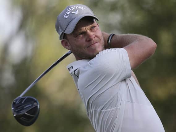 Danny Willett tees off on the second hole during the first round of the DP World Tour Championship in Dubai