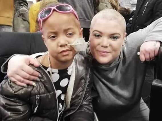 Terneesha with her mum Joanne, after she shaved her head at the Little Princesses Trust fundraiser