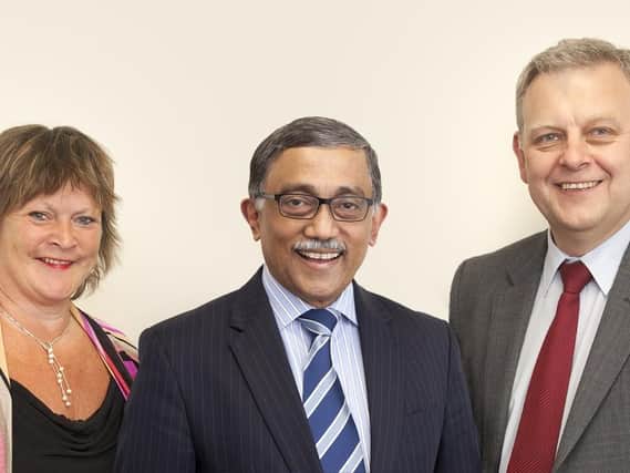 Mr Muhamad Quraishi (centre) with DBTH Chair, Suzy Brain England OBE (left) and DBTH Chief Executive, Richard Parker (right).