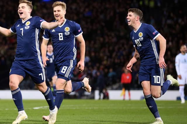 James Forrest celebrates his second goal for Scotland.