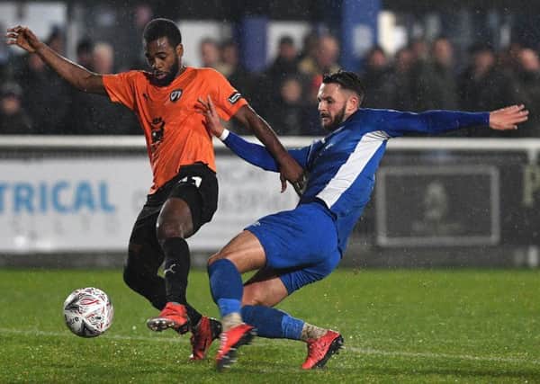 Picture Andrew Roe/AHPIX LTD, Football, Emirates FA Cup First Round Replay, Billericay Town v Chesterfield, AGP Arena, 20/11/18, K.O 7.45pm

Chesterfield's Zavon Hines is tackled by Billericay's Jake Howells

Andrew Roe>>>>>>>07826527594