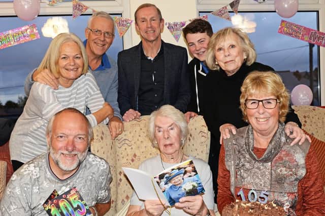 Dot Reardon, celebrates her 105th birthday with family members.