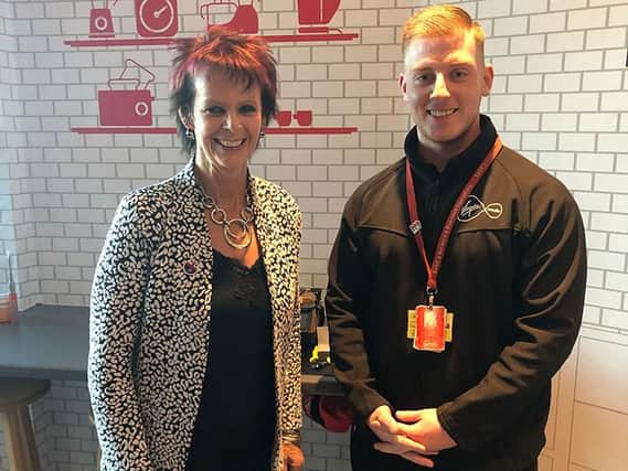 Anne Milton MP,  minister for skills, with a Virgin Media apprentice.