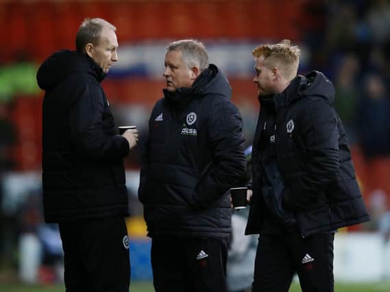 Sheffield United manager Chris Wilder (centre), Alan Knill and Matt Prestridge have discussed their transfer options