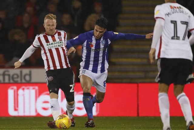 Mark Duffy of Sheffield Utd and Joey Pelupessy of Sheffield Wednesday during recent Sheffield derby: Simon Bellis/Sportimage