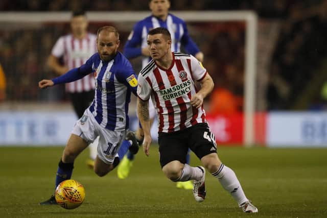 John Fleck of Sheffield United chased by Barry Bannan of Sheffield Wednesday. Picture: Simon Bellis/Sportimage