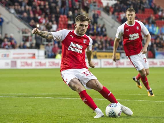 Rotherham's Ryan Manning fires home from the penalty spot
