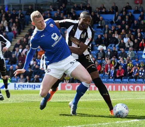 Picture Andrew Roe/AHPIX LTD, Football, EFL Sky Bet League Two, Chesterfield v Notts County, Proact Stadium, 25/03/18, K.O 1pm

Chesterfield's Alex Whitmore battles with County's Shola Ameobi

Andrew Roe>>>>>>>07826527594