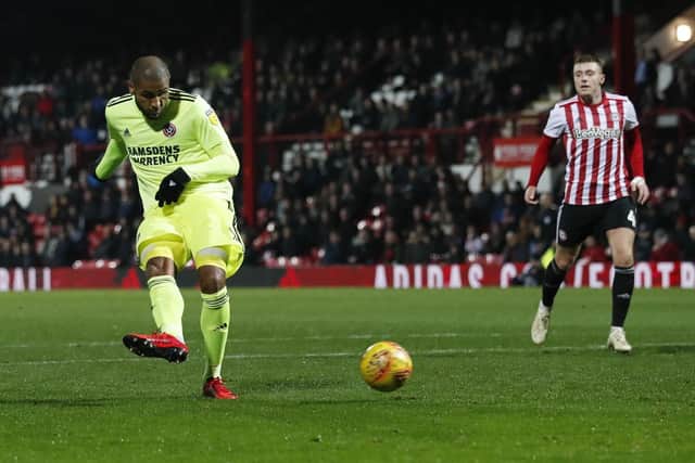 Leon Clarke of Sheffield Utd scores the third goal during the Sky Bet Championship match at the Griffin Park Stadium, London.  David Klein/Sportimage