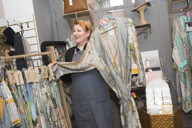 Rona Stevenson at Within Reason on Devonshire Street in  Sheffield with a robe worn by Nigella Lawson on her latest TV programme