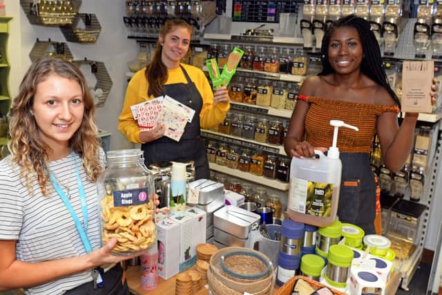 Shop Assistants and students l-r Amelia Smith, Jamie Jones and Leona Ogene, pictured in the Zero Waste Outlet. Picture: Marie Caley NSST-19-09-18-ZeroWasteShop-2
