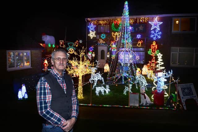 The Christmas Lights display at 52 Westfield Ave, Thurlstone, the home of David Horne. The Christmas wonderland is to raise money for West Yorkshire Dog Rescue. Pictured is David. Picture: Steve Ellis