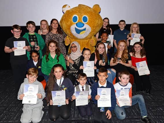 Theo the Bear and Ashleigh Porter-Exley, pictured with winners and finalists of this years Sheffield Super Kids Awards.