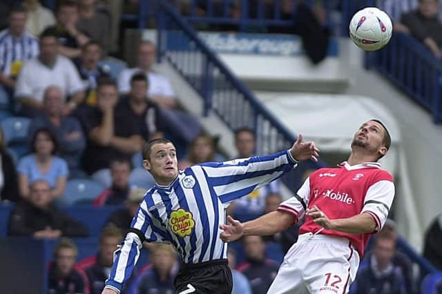 Action from the August 2002 clash between Sheffield Wednesday and Rotherham United with Alan Quinn and Stewart Talbot vying for the ball