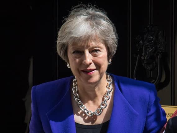 Theresa May should stand down after next year's Brexit day and pave the way for a "new generation leader", her former policy adviser has said.