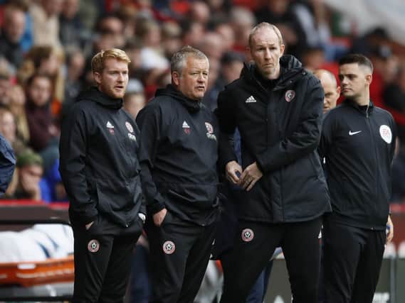 Chris Wilder (centre) manager and Alan Knill (right)have guided Sheffield United to third in the table: Simon Bellis/Sportimage