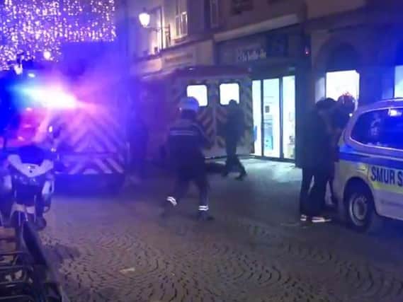 Handout video grab taken with permission from the Twitter page of Robbert Baruch @RBaruch of emergency services at the scene in Strasbourg amid reports of gunshots close to the city's Christmas market. PRESS ASSOCIATION Photo.