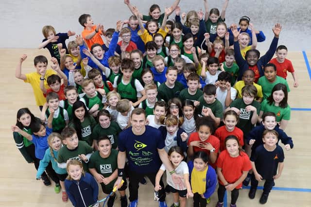 One Health Primary Schools Squash Festival at Hallamshire Tennis and Squash Club,Ecclesall Road with Sheffield's 3 time World Squash Champion Nick Matthew.Pictured is Nick with the competitors taking part in the Festival.....Pic Steve Ellis
