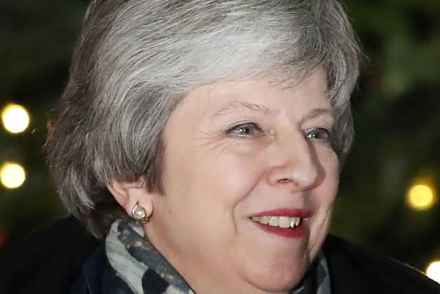 Prime Minister Theresa May arrives back at 10 Downing Street, London, after Conservative MPs held a vote of confidence in her leadership. Picture: Andrew Matthews/PA Wire