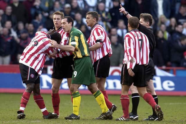 Sheffield United's Patrick Suffo (left) sees red against West Brom in the Battle of Bramall Lane