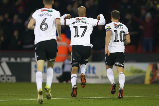 David McGoldrick celebrates his goal against West Brom with Chris Basham and Billy Sharp
