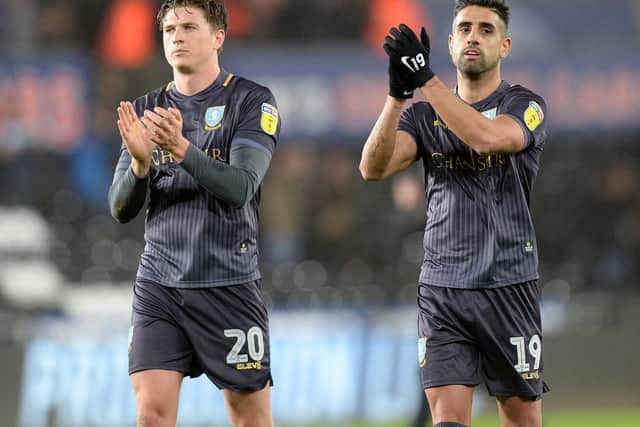 Owls pair Adam Reach and Marco Matias at the final whistle.....Pic Steve Ellis