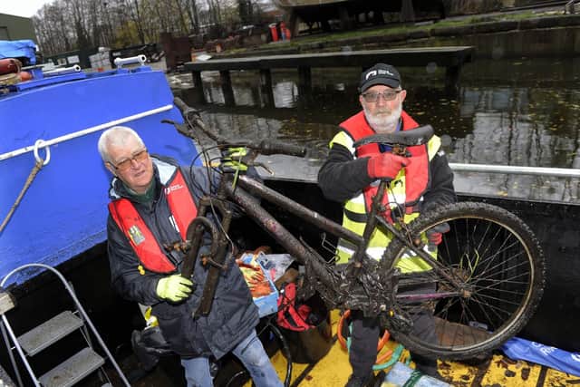 Blue Loop volunteers John Blackburn (right) and Tony Richardson with a bike they lifted from the Tinsley Canal