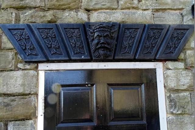 The clue picture of the lintel with a vague resemblance of Father Christmas - but with horns
