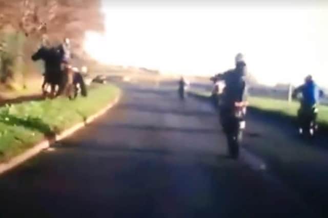 Bikes speed past horses in Sheffield