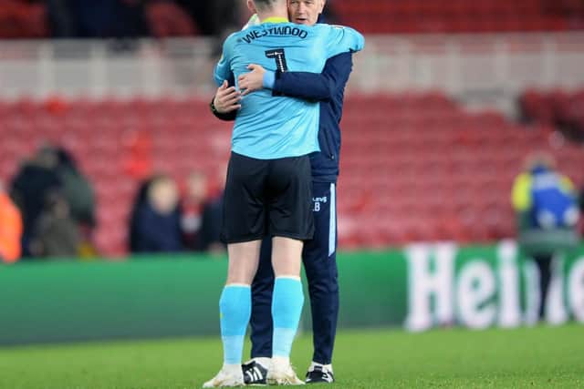 A delighted Owls keeper Keiren Westwood at the final whistle with caretaker Manager Lee Bullen......Pic Steve Ellis