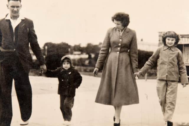 Eric and Evelyn Colley with their daughters Gail and Enid