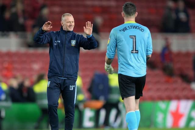 Owls keeper Keiren Westwood shares a Boxing day win with caretaker Manager Lee Bullen....Pic Steve Ellis