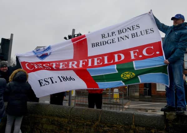Chesterfield FC fans demonstrate outside the ground before the match