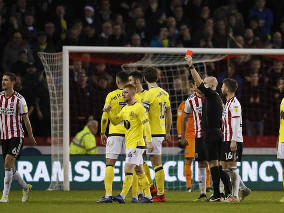 Chris Basham will miss the game against Wigan Athletic: Simon Bellis/Sportimage