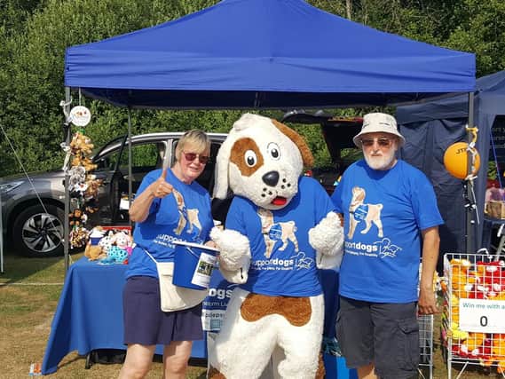 Syd and Liz Moyle, of Rotherham, who have been fundraising for Sheffield-based charity Support Dogs for ten years.