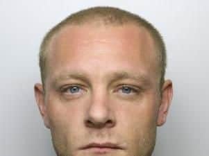 Jailed for 12-and-a-half years after being found guilty of a prison attack on a fellow inmate which left him scarred for life.