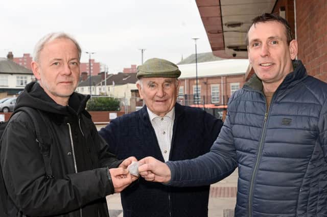 David Holyoak (right) and John Brown (middle), pictured handing over the RAF ID Tag of William Stephen Whalley, to his Nephew Stephen Whalley. Picture: Marie Caley