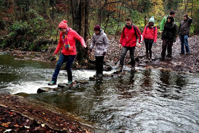 Netwalking in the Porter Valley: Faye Smith leads across the ford near Whiteley Woods