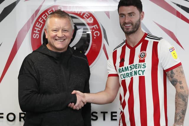 Gary Madine and Sheffield United manager Chris Wilder: Simon Bellis/Sportimage